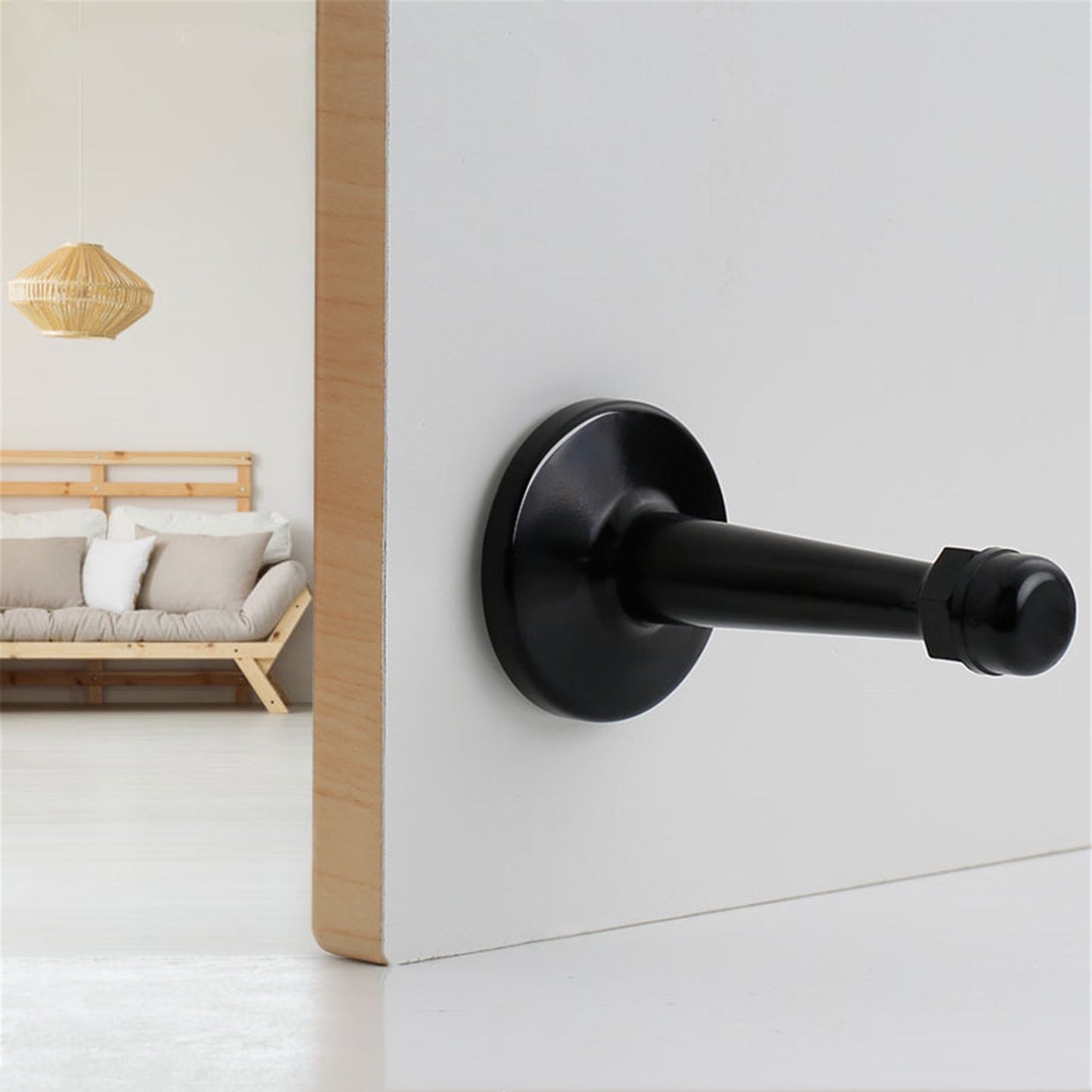 The Heavyweight Wall-Mounted Door Stop — Matte Black