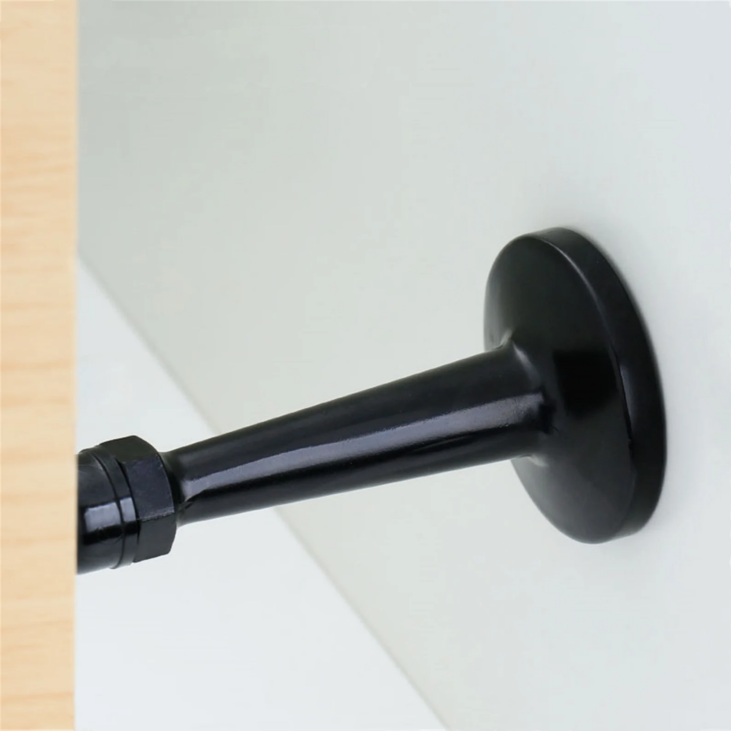 The Heavyweight Wall-Mounted Door Stop — Matte Black
