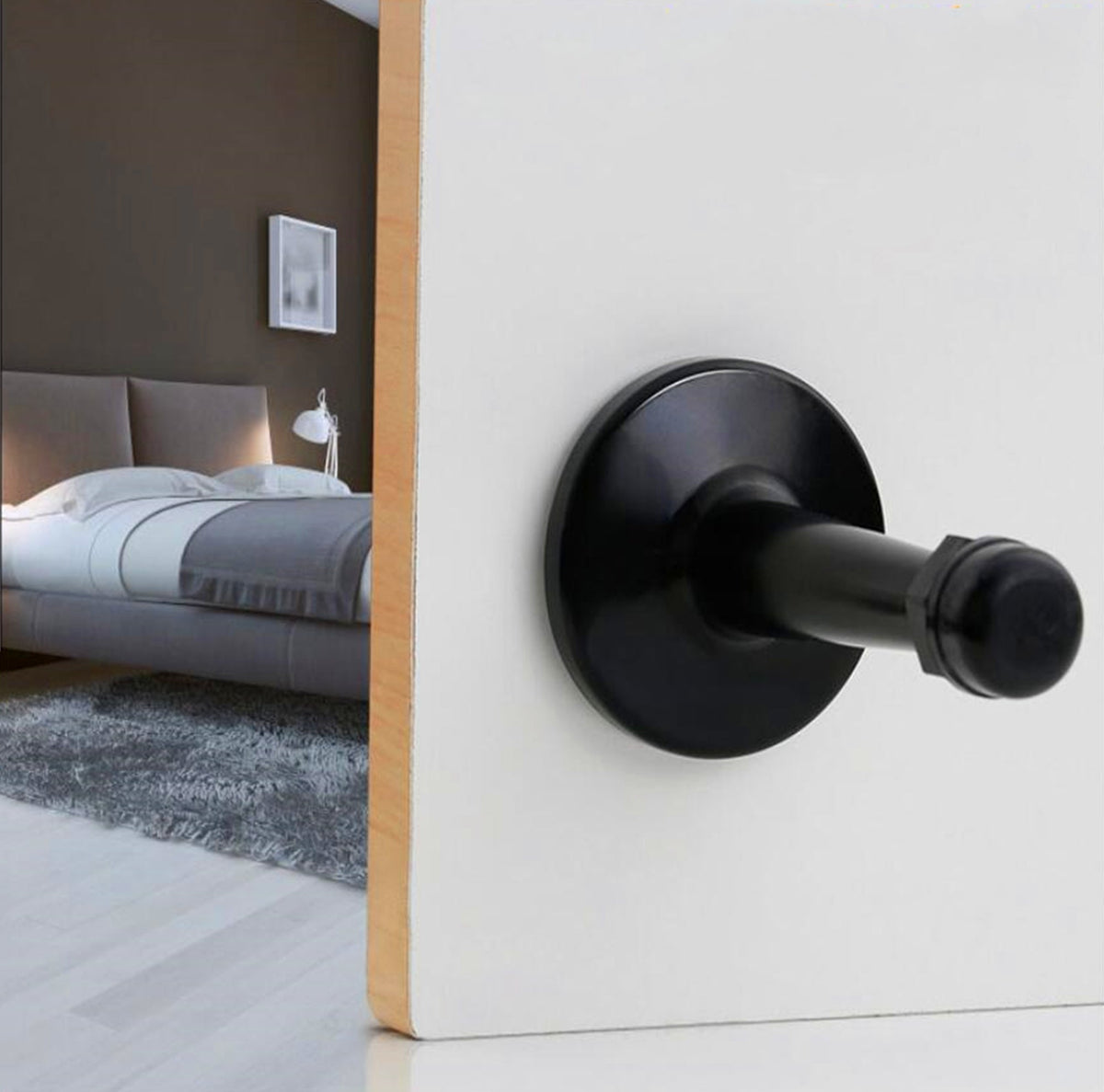 The Heavyweight Wall-Mounted Door Stop — Matte Black