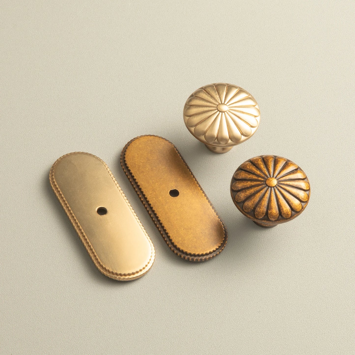 The Serrated Oval Backplate Drawer Knob (6-Pack), 1-3/8" — Brushed Brass