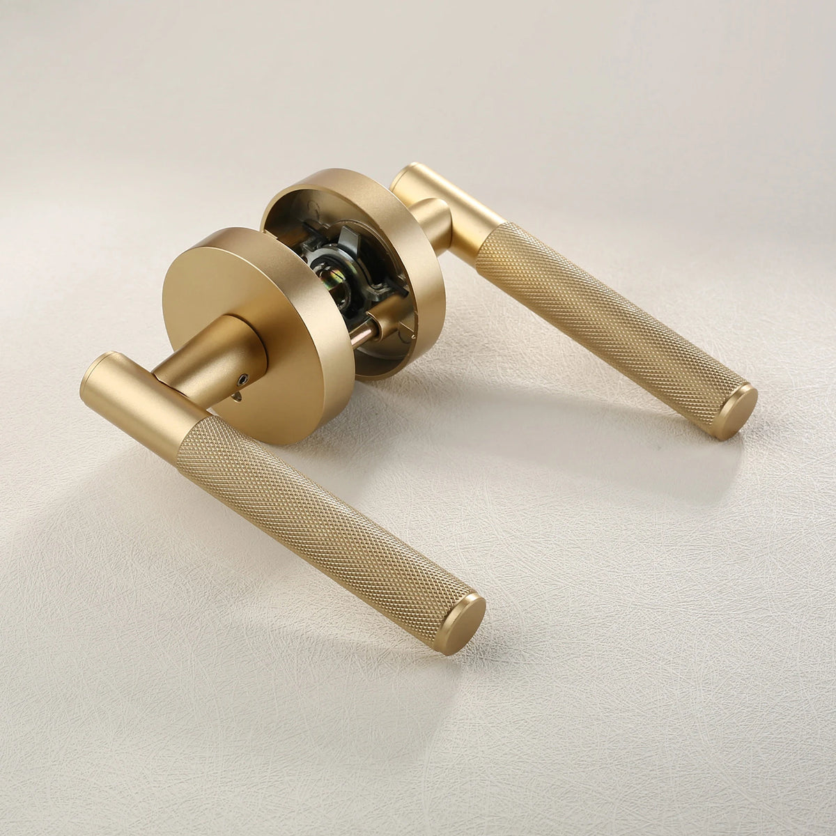 The Knurled Round-Base Privacy Door Lever — Brushed Brass