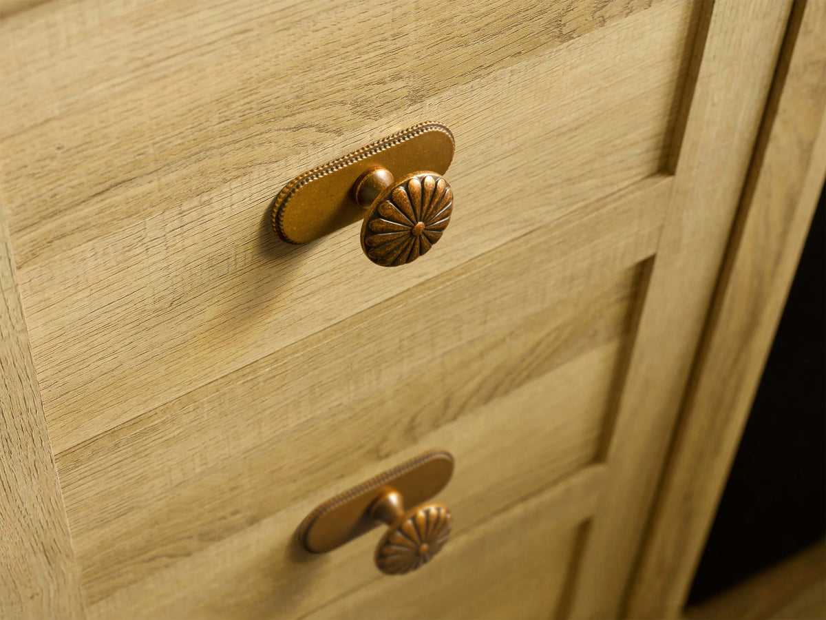 The Serrated Oval Backplate Drawer Knob (6-Pack), 1-3/8" — Brushed Brass