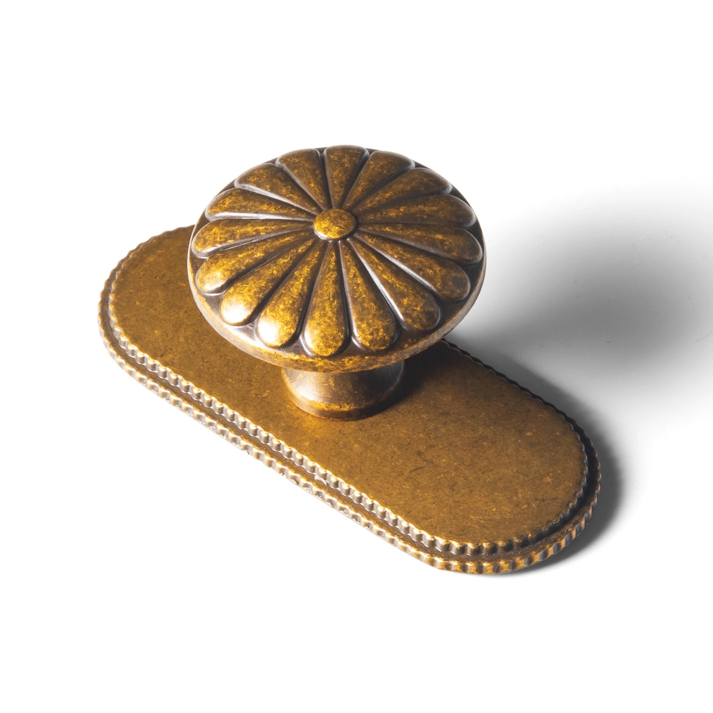 The Serrated Oval Backplate Drawer Knob (6-Pack), 1-3/8" — Brushed Brass