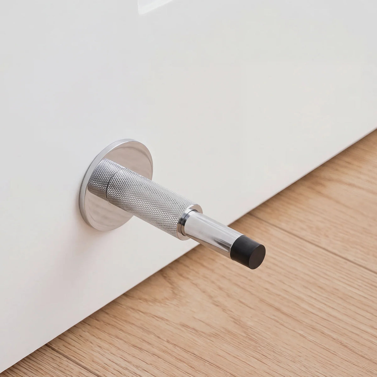 The Knurled Adjustable Floor & Wall Door Stop — Brushed Brass