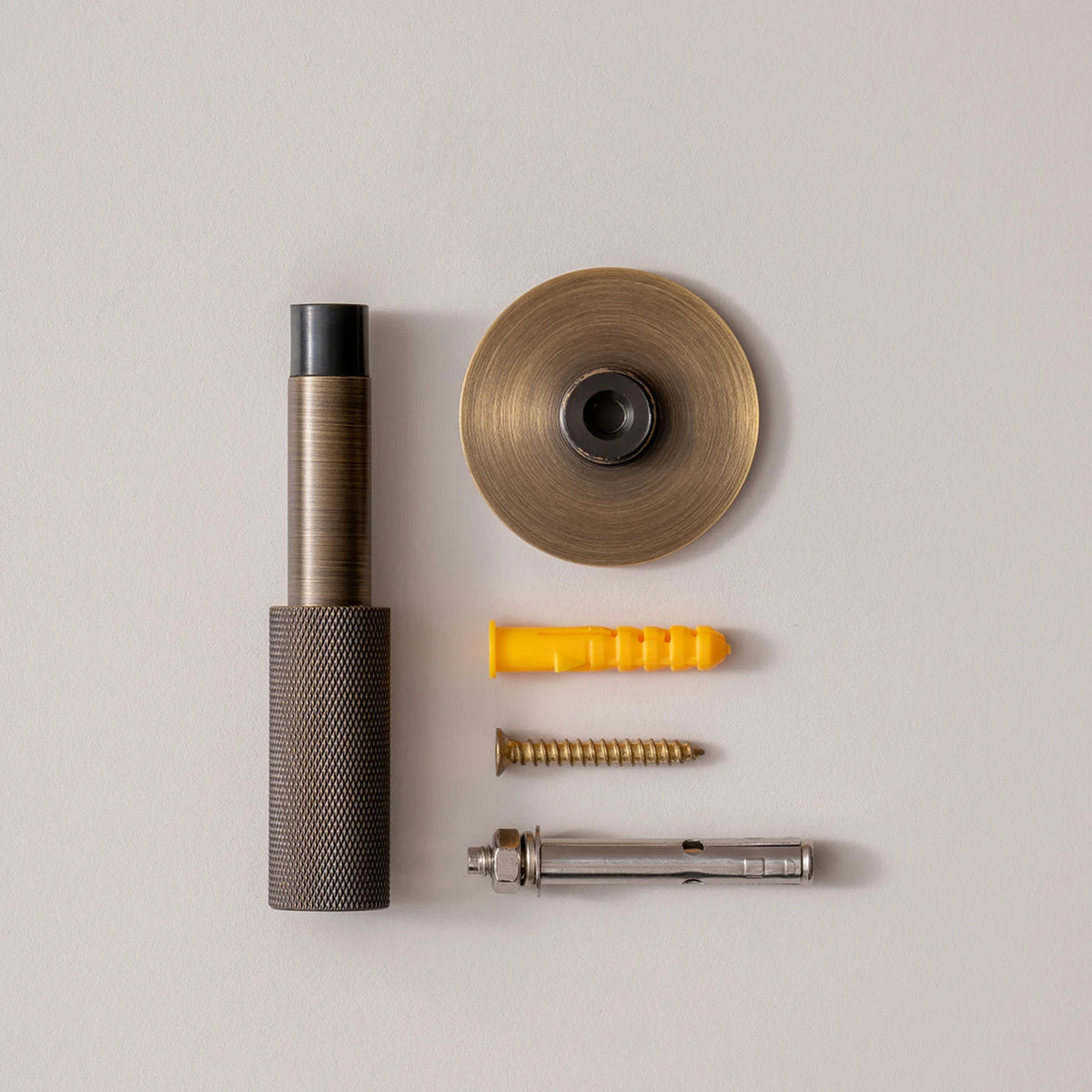 The Knurled Adjustable Floor & Wall Door Stop — Brushed Brass