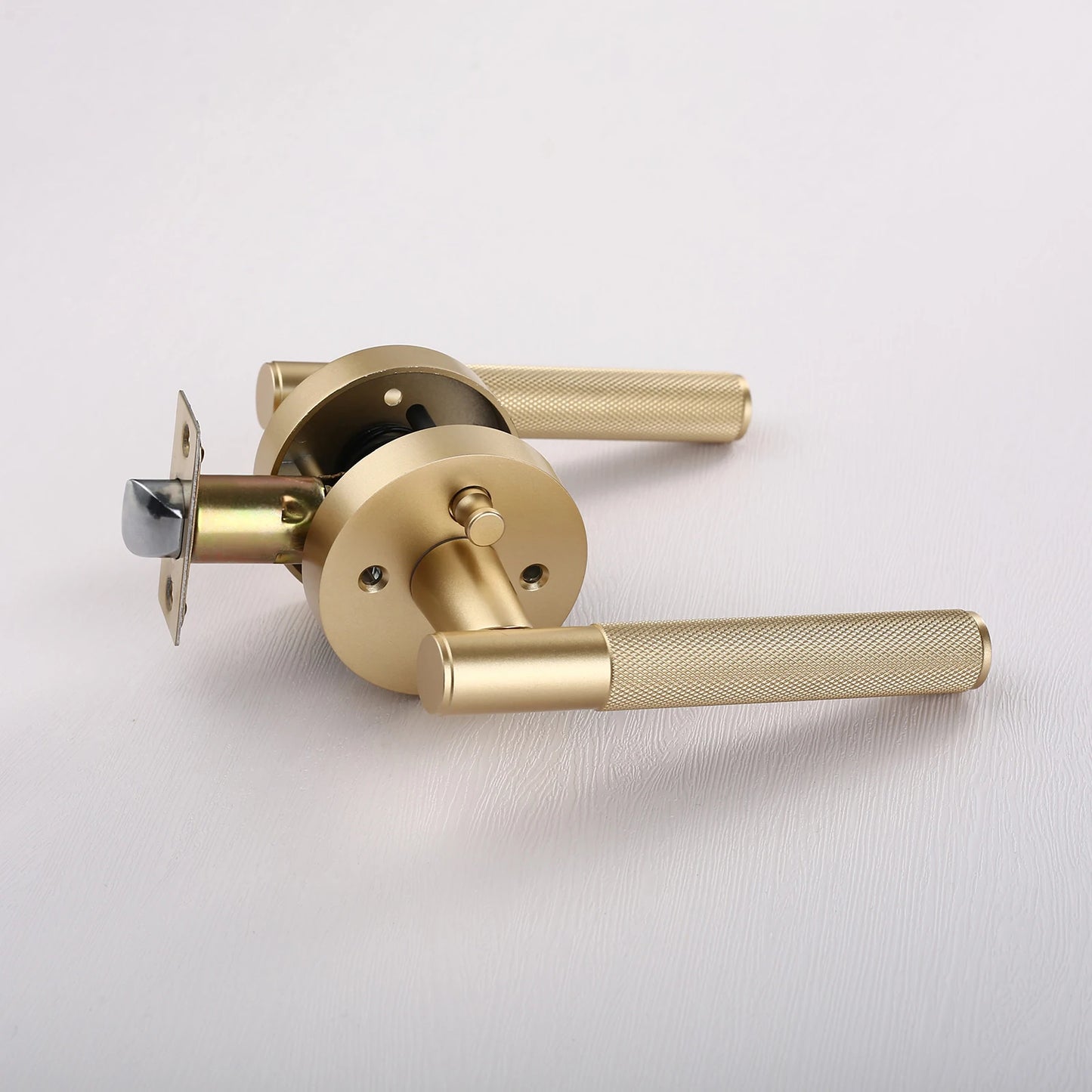 The Knurled Round-Base Privacy Door Lever — Brushed Brass